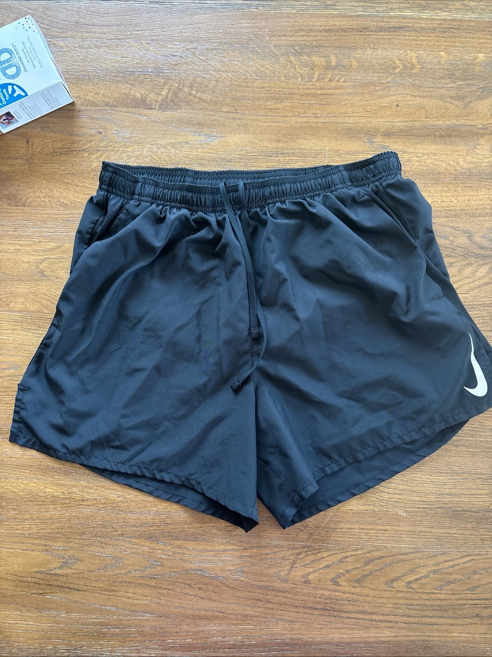 Men’s 3 Pocket Nike Black Running Shorts with White Swoosh